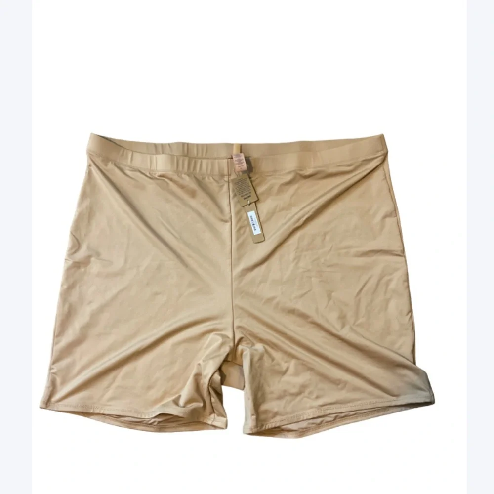 Skims Swim Mid waist ochre short